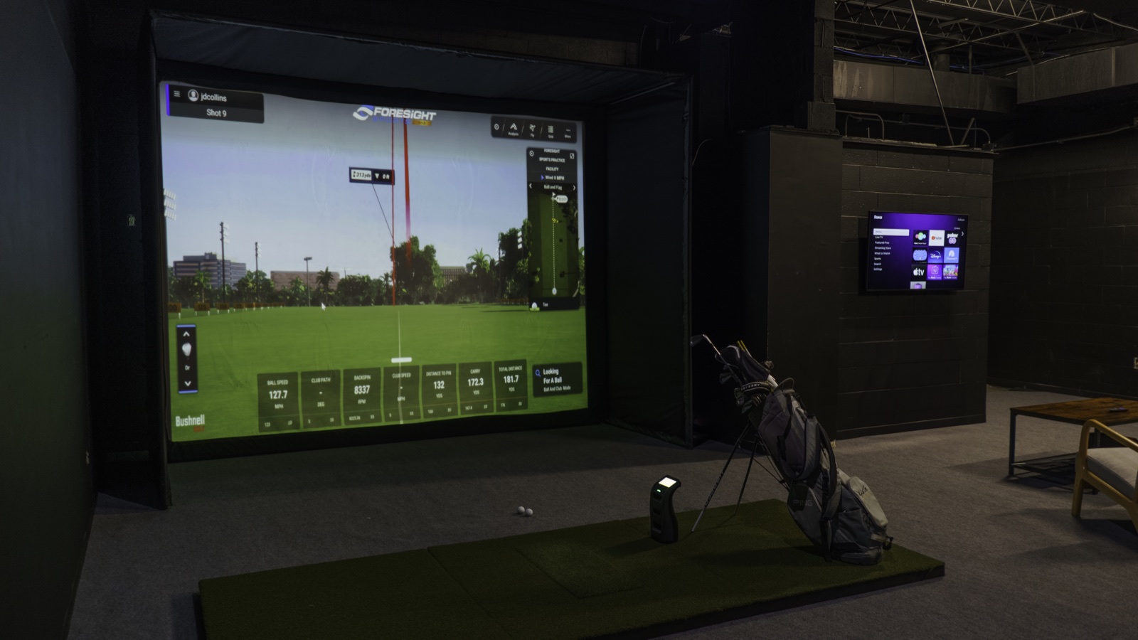 Indoor golf simulator bays at Southland