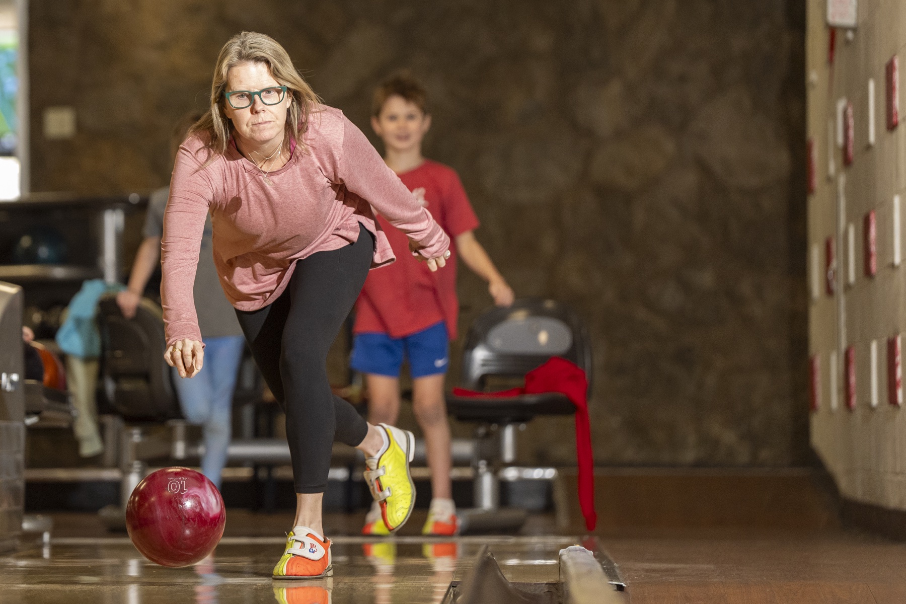 A bowler releasing the ball at Southland Lanes