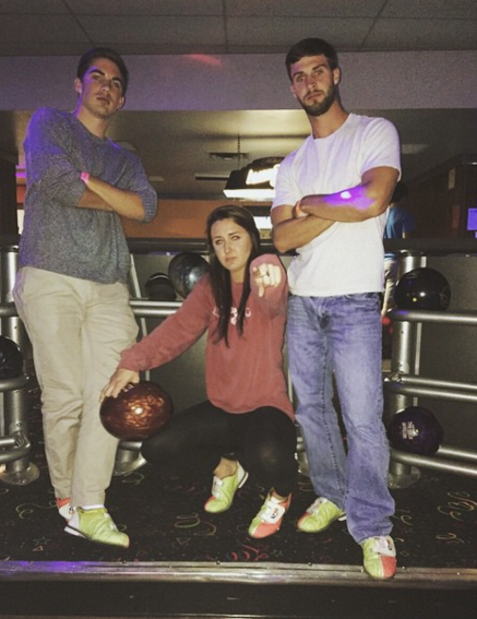 A social group of younger adults gathering on the lanes at Southland