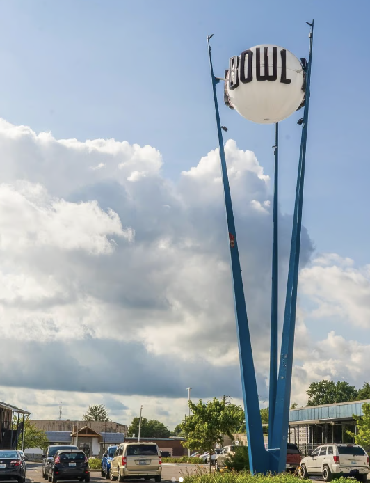 The complete iconic Southland BOWL sign with its bowling ball and blue supports
